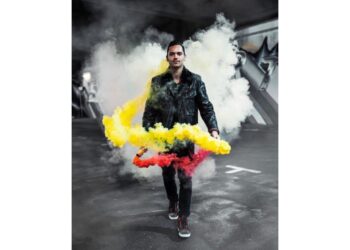 NASHEW finds solace in music and emerges as a refined German rapper and musical talent.