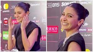 While being addressed as “Mrs. Kohli,” Anushka Sharma begs the paparazzi to “relax.” Watch