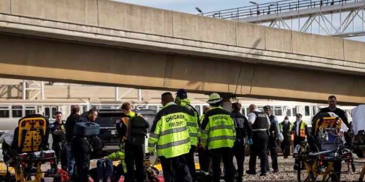 Nearly 40 people are injured, some seriously, when a Chicago commuter train crashes into rail equipment