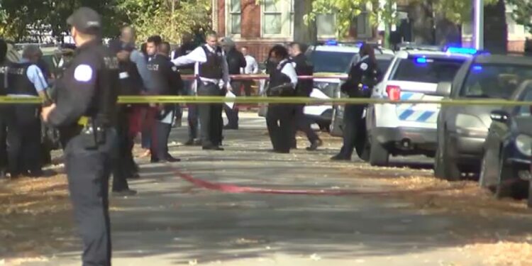 In a shootout, a Chicago Police officer was wounded and a suspect was ...