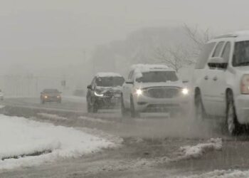 Two waves of snow are moving into the city and some suburbs of Chicago